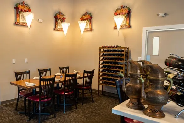Cravings And Delight dining room in southwest Edmonton, where breakfast, lunch and dinner delivery orders are packed